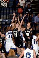 Cerbi Jumping For A Rebound While Linzee Watches