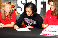Olive Naotala Signing Letter Of Intent With Coaches Nicole Dickson And Kelly Raines Watching