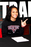 Olive Naotala With "Guns Up"