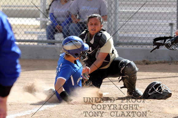 Angelina Tagging Out A Runner At Home Plate