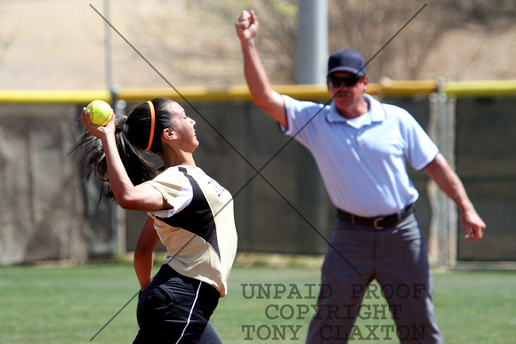Laura Throwing To First To Complete A Double Play