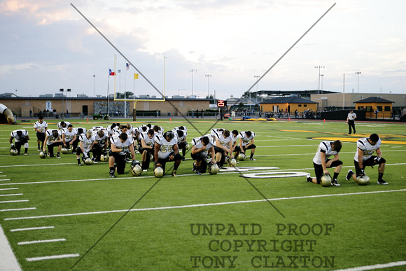 Team Praying Before The Game