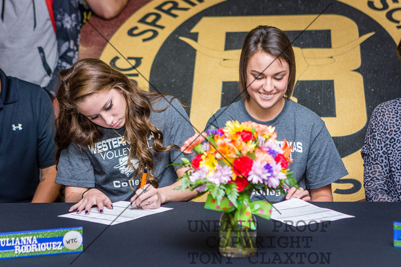 Julianna Rodriguez And Erin Pollard Signing Their Letters Of Int