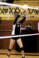 Taylor Setting The Ball Over The Net