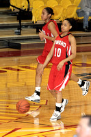 Twyla Ards Dribbling The Ball With Asia Reid In The Background