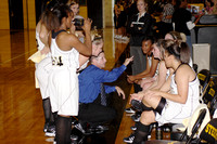 Coach Warren Talking To Team During a Time Out