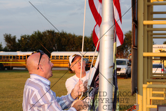 Alex Childress And Jerry Holton Raising The Flag