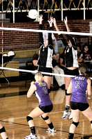 Cerbi And Taylor Jumping To Block A Hit