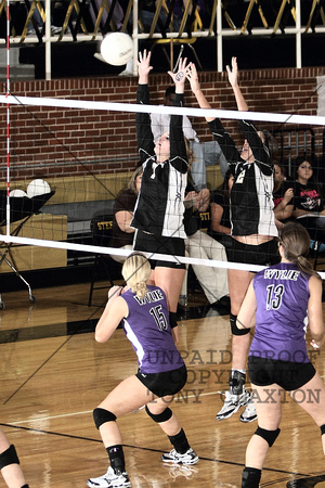 Cerbi And Taylor Jumping To Block A Hit
