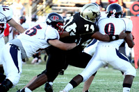 Pernell Tackling The Ball Carrier For A Loss
