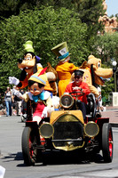 Goofy, Pinocchio, Mad Hatter and Pluto Riding In Car