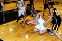 Cerbi Picking Up A Loose Ball With Linzee Coming To Get It
