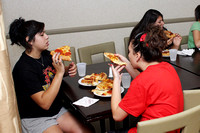 Sophia, Jerilyn and Benjamina Eating Pizza