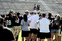 Coaches Talking To The Players