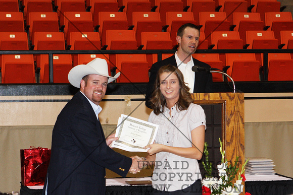 Jessica Kimbro Receiving A Certificate For Livestock Judging From Cash Berry