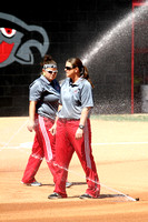 Coaches Kelly Raines And Kaycee Taylor Watering The Infield