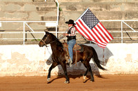 20110415-190706-HCRodeoTeamMemberCarryingTheAmericanFlag