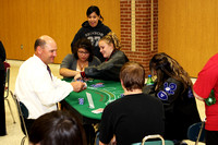 Principal Ritchey Dealing Poker