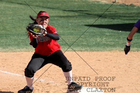 Faith Koria Catching The Ball At First For An Out