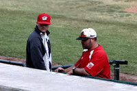 Coach Thomas In Front Of The Dugout