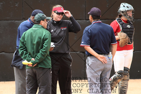 Coach Rains Talking With Midland's Coach And Officials Before The Game
