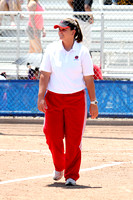 Coach Kelly Raines Walking To Third Base