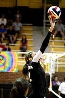 Taylor Tipping The Ball Over The Net