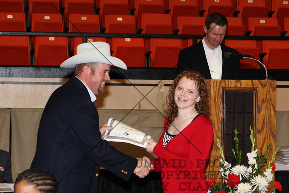 LuCinda Birkenfeld Receiving A Certificate For Livestock Judging From Cash Berry