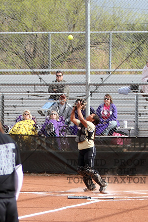 Angelina Catching A Pop Fly In Front Of Home Plate