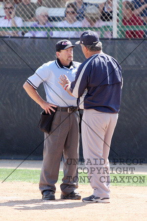 Frank Phillips Coach Discussing A Call With The Umpire
