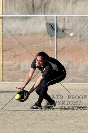 Vicki Fielding A Ground Ball In Left Field
