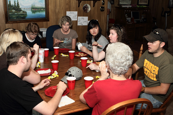 People Sitting At The Table Eating