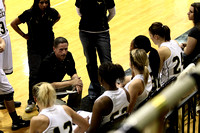 Coach Warren Talking To The Team During A Time Out