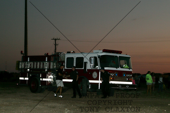 Fire Truck And Crew Standing By