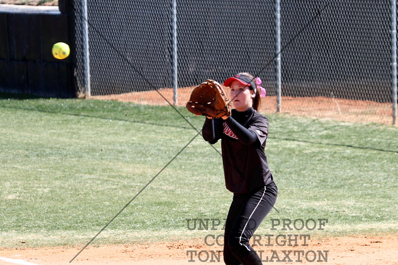 Carlyn Teichmann Catching A Throw For An Out