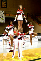 Cheerleaders Working On A Stunt