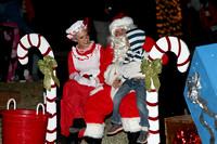 Santa And Mrs. Claus Listen To A Child