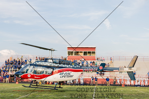 Air Evac Lifeteam Delivering The Game Ball And Coin