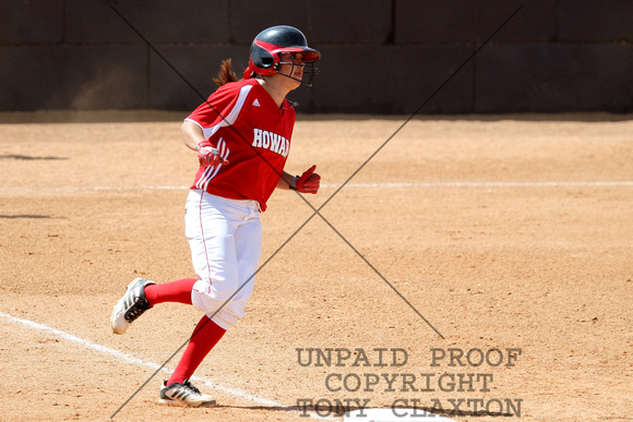 Megan Granado Running To First With A Home Run