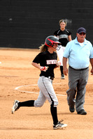 Shelby Shelton Running To Third With A Home Run