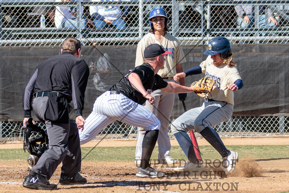 Owen Millar Tagging Runner Out At Home Plate