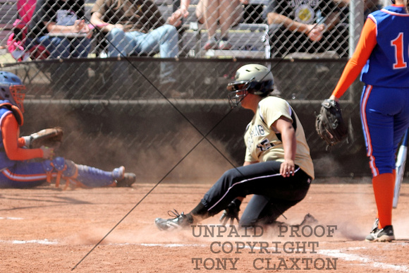 Angelina Sliding Safely Into Home For The First Run Of The Game