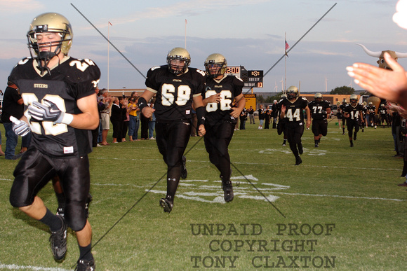 Football Team Coming Onto The Field