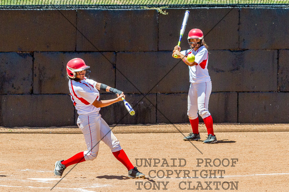 Katie Reyes Hitting A Home Run While Teammate Shelby Ume Watches