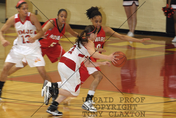 Twyla Ards Guarding The Ball With Asia Reid In The Background