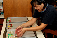 Brenda Putting Cookies In A Pan