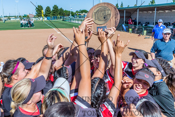 Howard College Softball Team Holding Up The Region V West Trophy