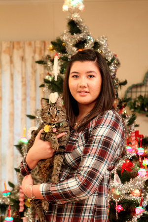 Andrea And Caterpillar In Front Of The Christmas Tree