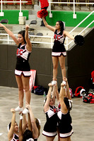 Cheerleaders Performing A Stunt