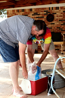 Allen And Ty Filling The Ice Cream Churn With Ice